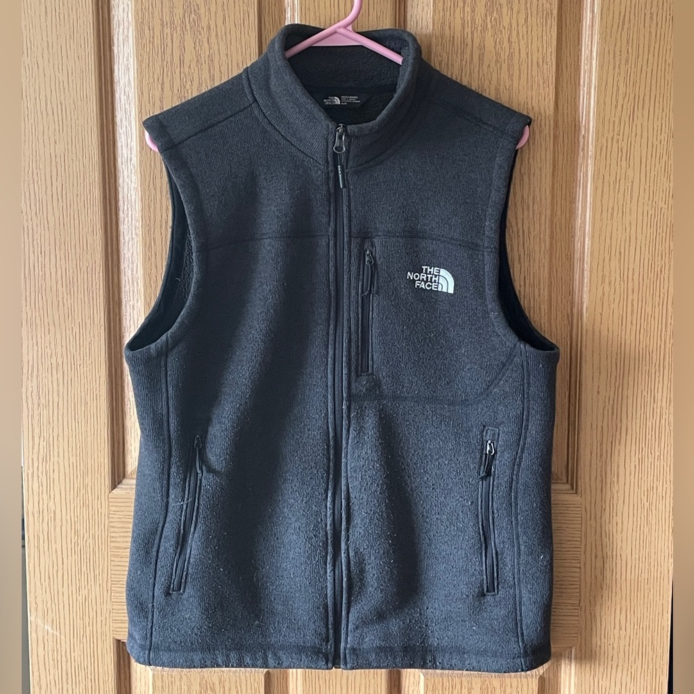 North Face fleece vest size M. Slight pilling as most vests have. Looks great!